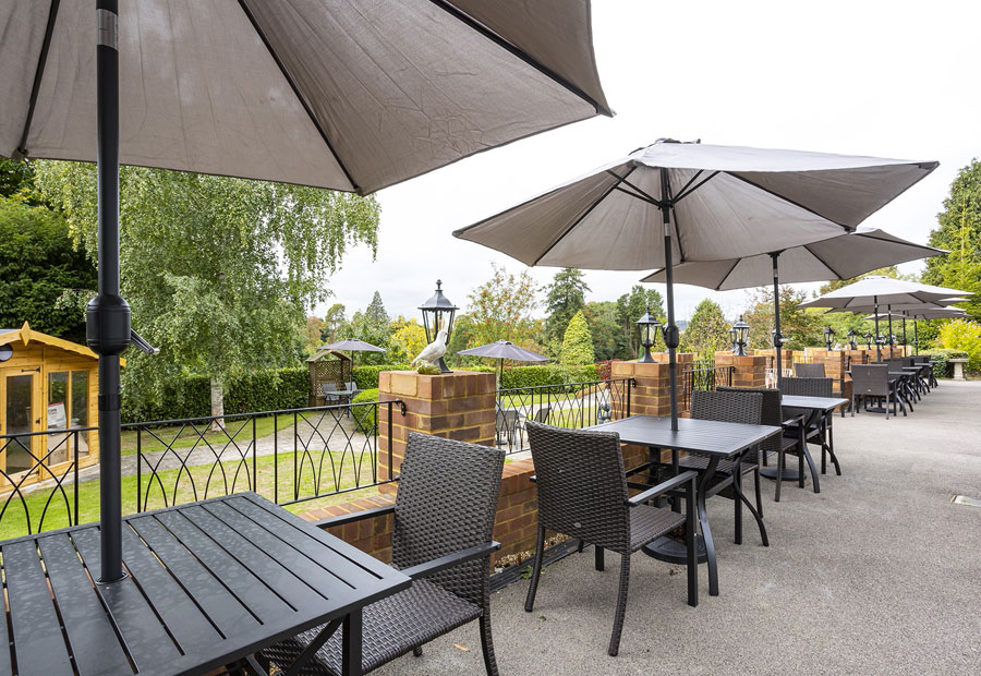 Best Care Home In Surrey - Garden Seating Area