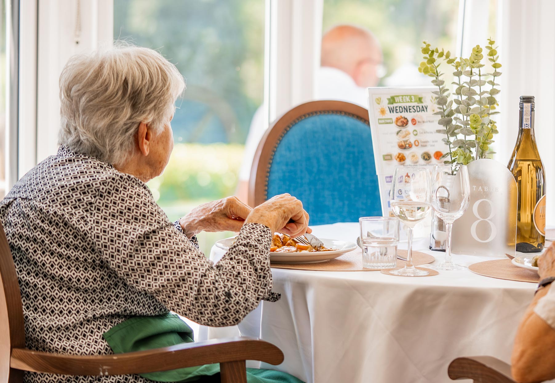 Best Care Home In Surrey - Having Dinner